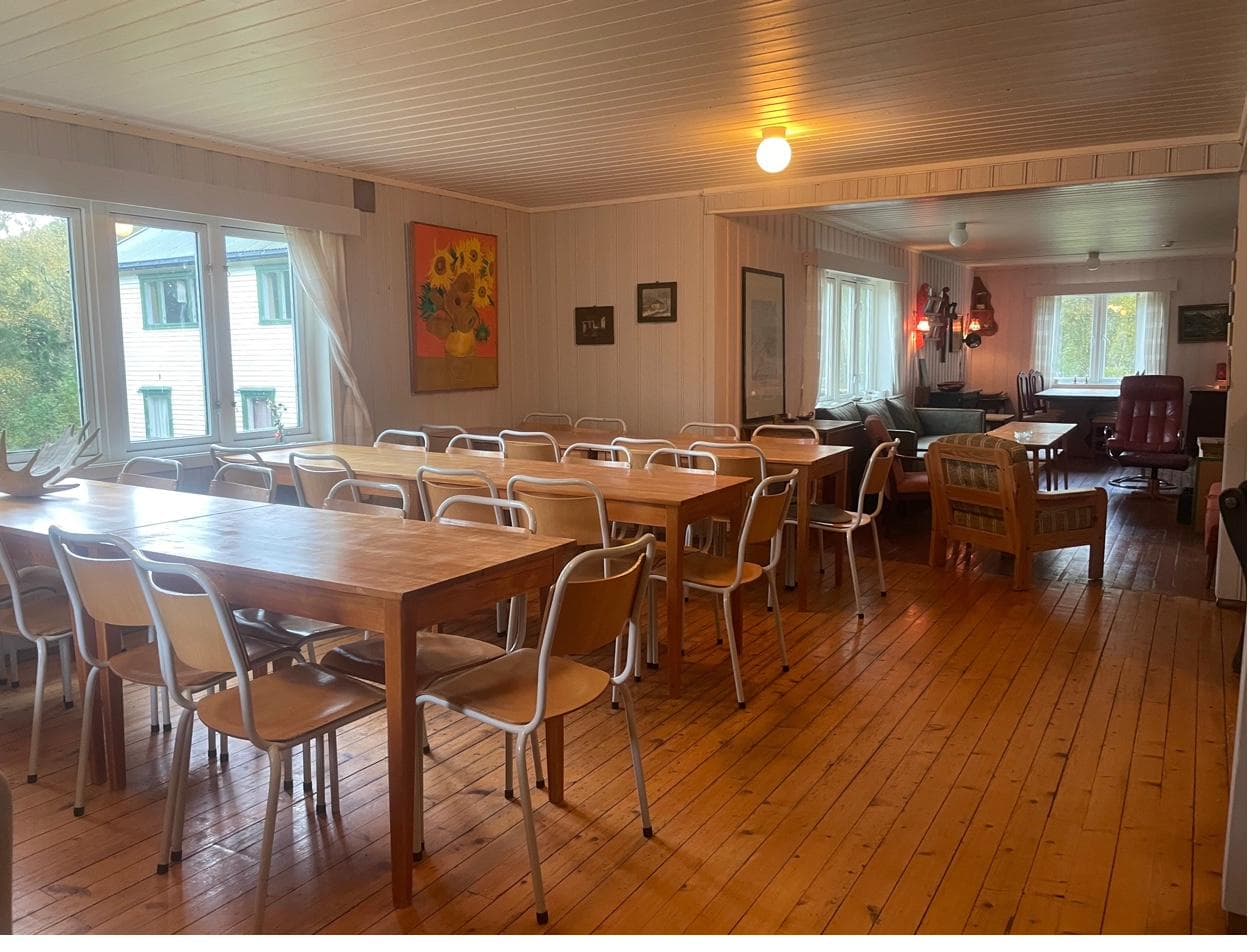 Large dining room with wooden floors
